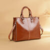 Stylish brown leather handbag on display